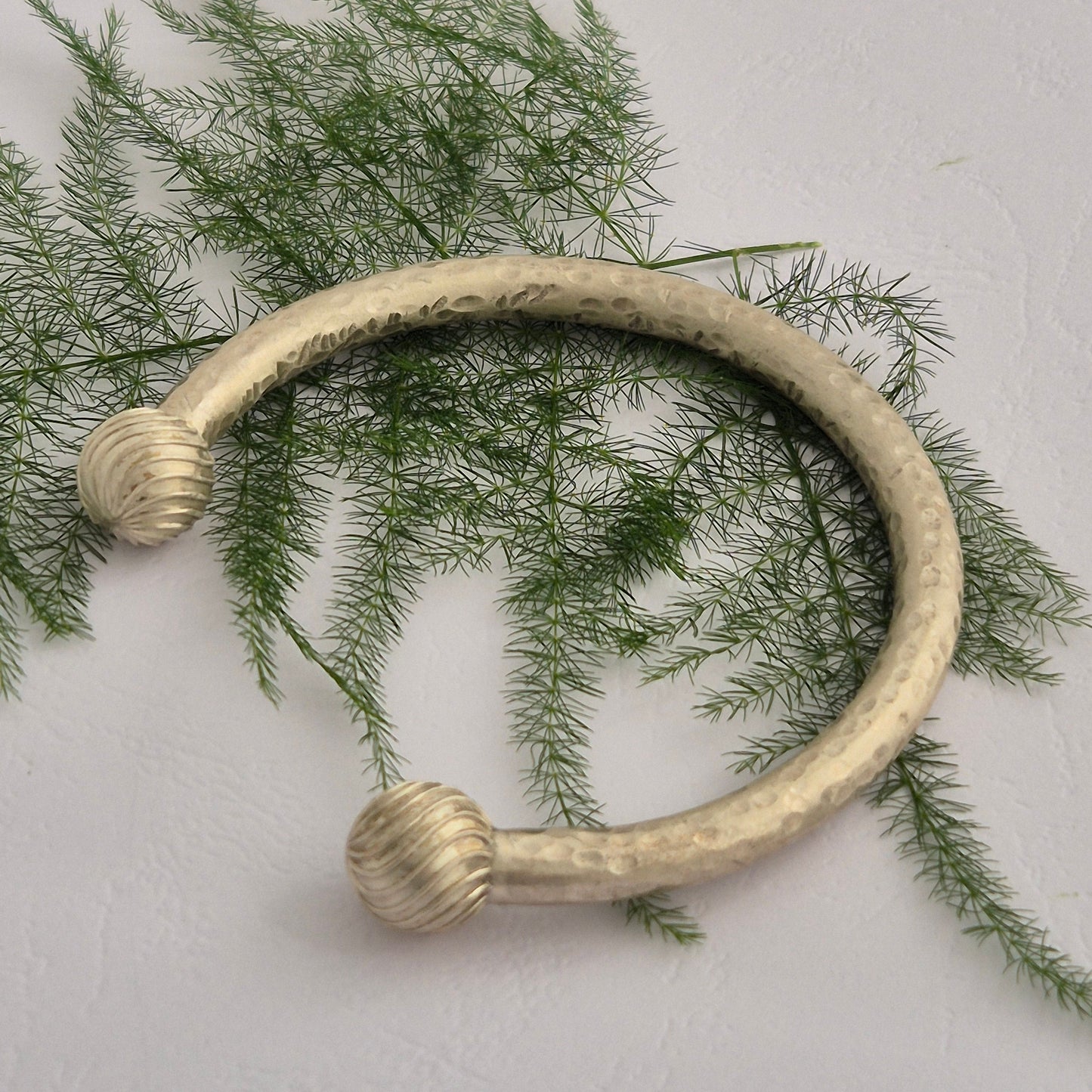 Spiral globe bangle